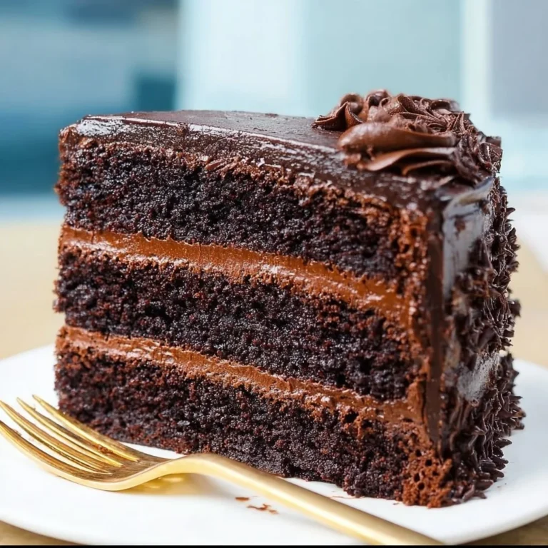 Decadent Death by Chocolate Cake topped with rich chocolate ganache