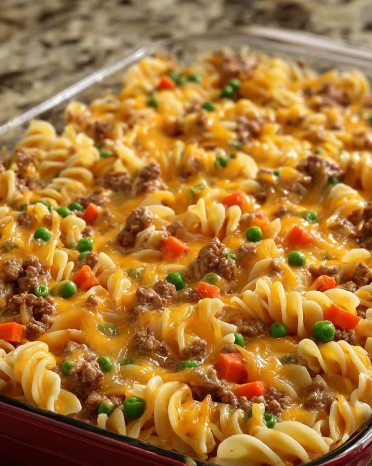 Amish Sunday Savior Casserole serving dish with fluffy layers of flavor.