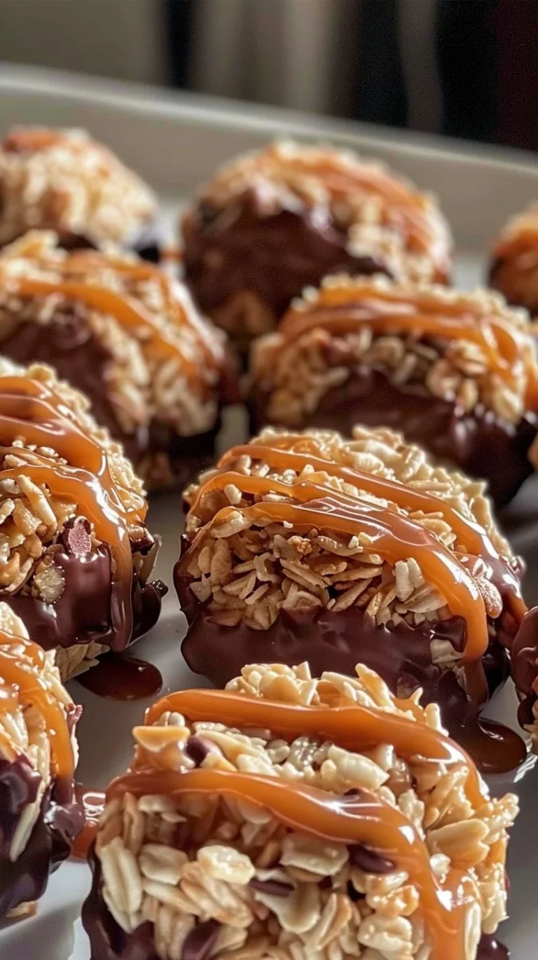 Easy no-bake Samoa cookies topped with caramel and coconut on a plate.