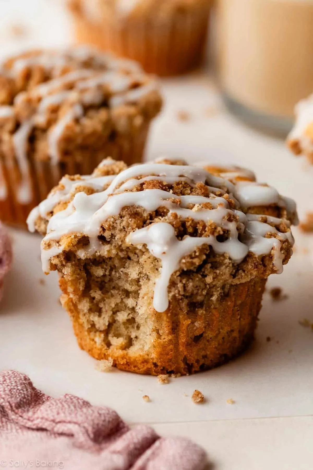 Delicious crumb cake muffins with a crunchy topping ready to enjoy.